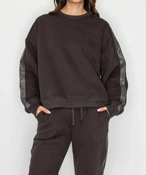 NEW KNIT RIOT stride track sweatshirt in charcoal